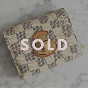 Louis Vuitton Koala Wallet
